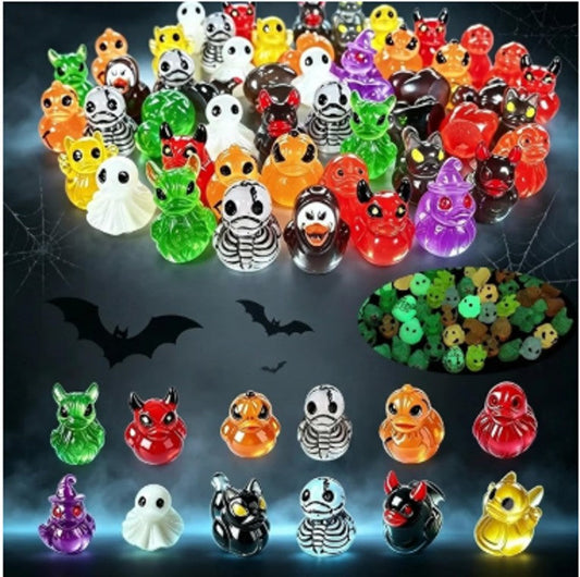 Boolume Glow Skull Ducks — assorted glow-in-the-dark devil, ghost and skull duck figurines